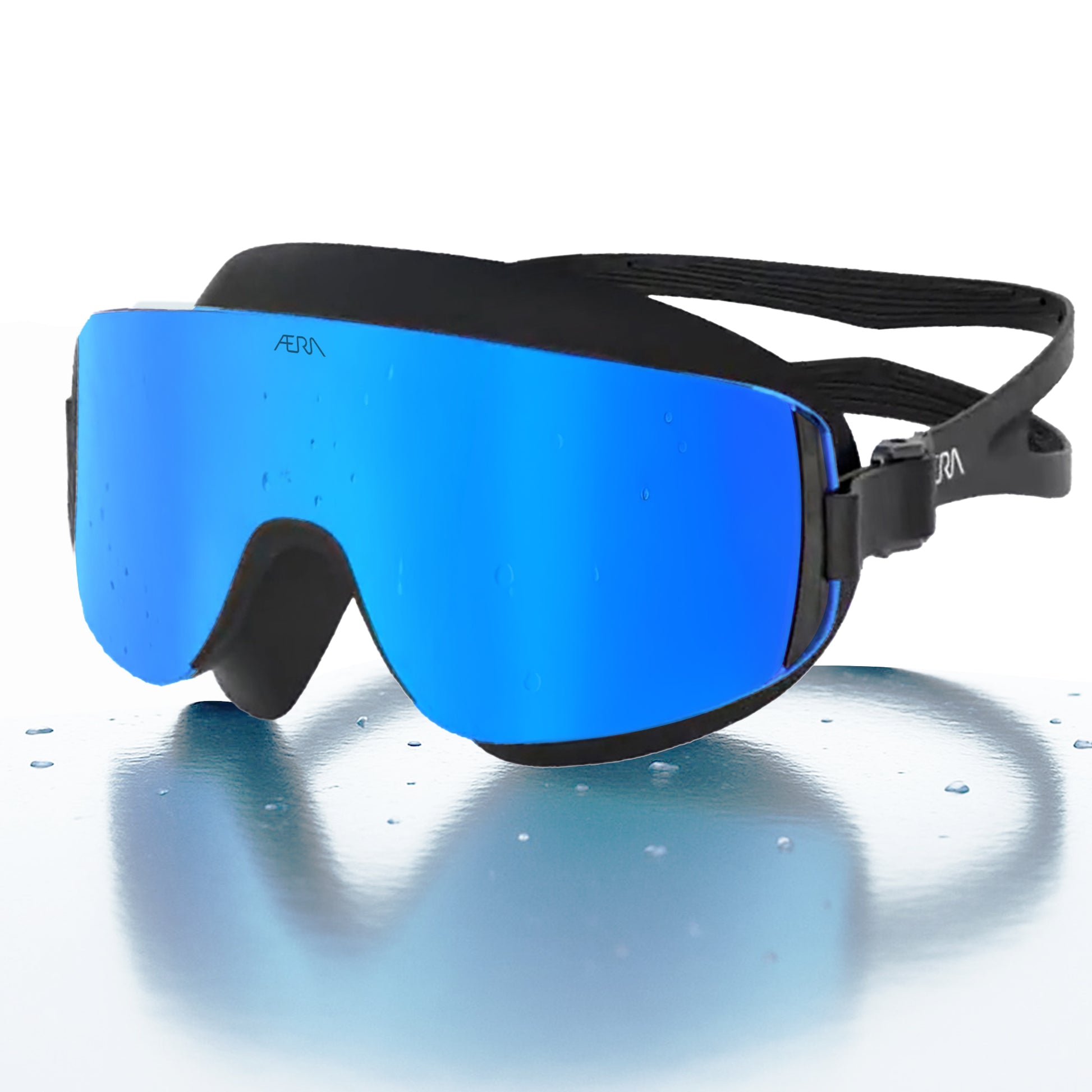ÆRA Blue Steel swimming goggles in blue and black with AERA branding, featuring anti-fog lenses and UV protection for adults.