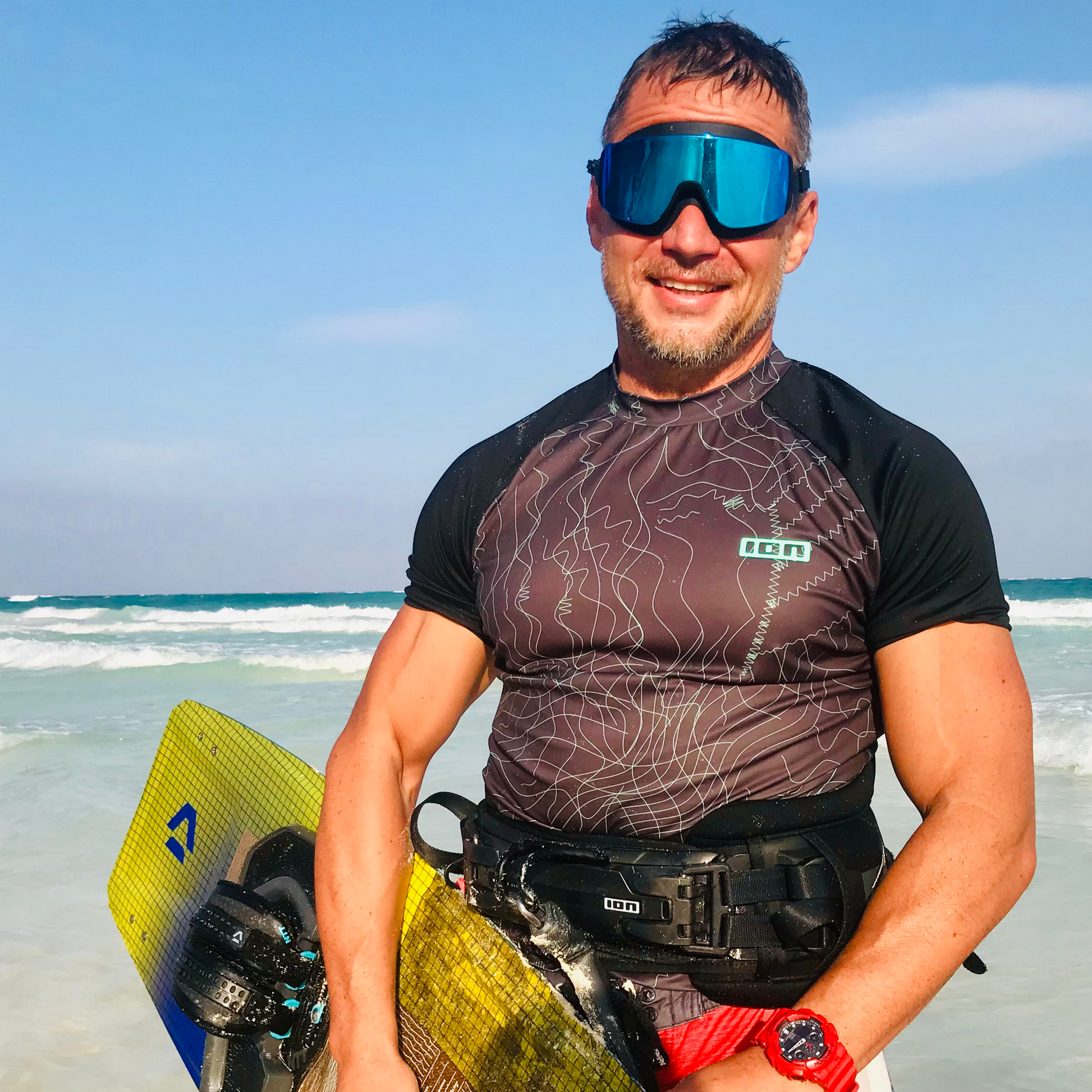Male kitesurfer wearing AERA Sports