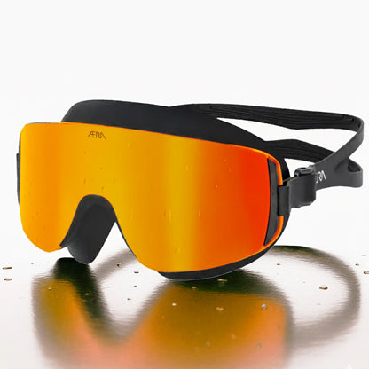 ÆRA Fire swimming goggles in red and orange with AERA branding on white background, featuring anti-fog lenses and UV protection for adults