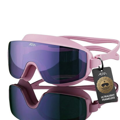 ÆRA Blushwave swimming goggles in pink and purple with AERA branding on white background, featuring anti-fog lenses and UV protection for adults