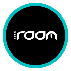 Logo of 'The Room' with a black center and teal border on a white background